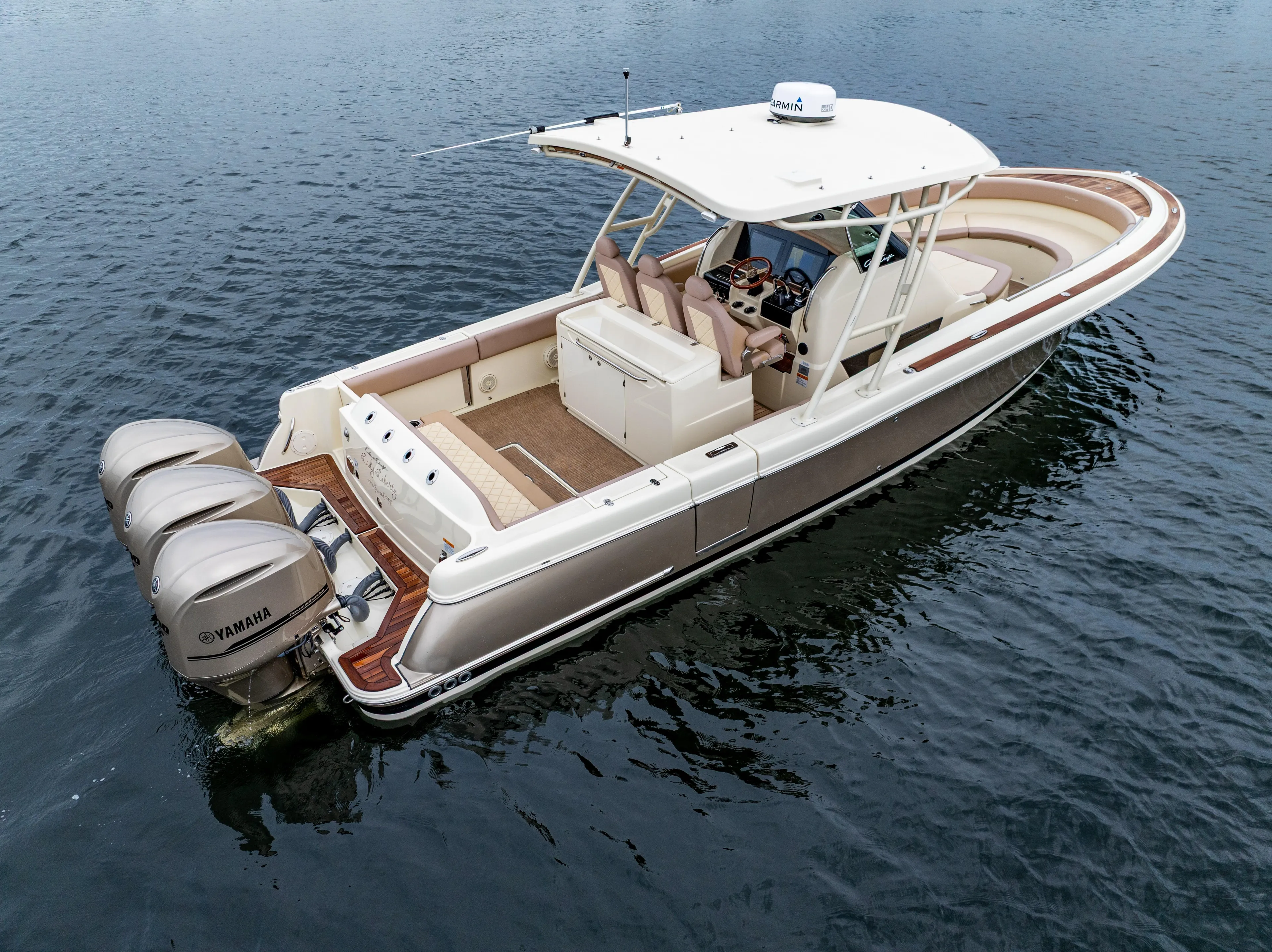 Lady Liberty Yacht Photos Pics 2018 Chris-Craft Catalina 34 boat with triple Yamaha engines on water.