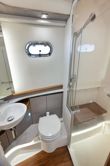 Sea Ya Yacht Photos Pics Luxurious 2022 Tiara Sport 48LS yacht bathroom with modern fixtures and elegant design.