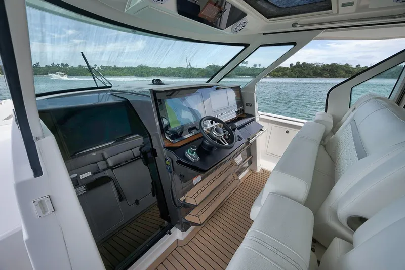 Sea Ya Yacht Photos Pics Interior of 2022 Tiara Sport 48LS yacht with modern helm and seating.