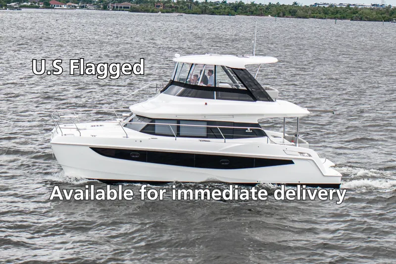  Yacht Photos Pics 2024 Aquila 42 Yacht cruising on water, U.S. flagged, available for immediate delivery.