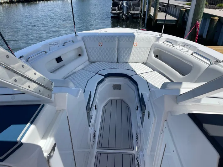  Yacht Photos Pics 2024 Sea Fox 288 Traveler boat interior with white seating and deck.