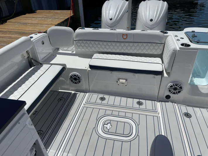  Yacht Photos Pics 2024 Sea Fox 288 Traveler boat interior with seating and twin engines.