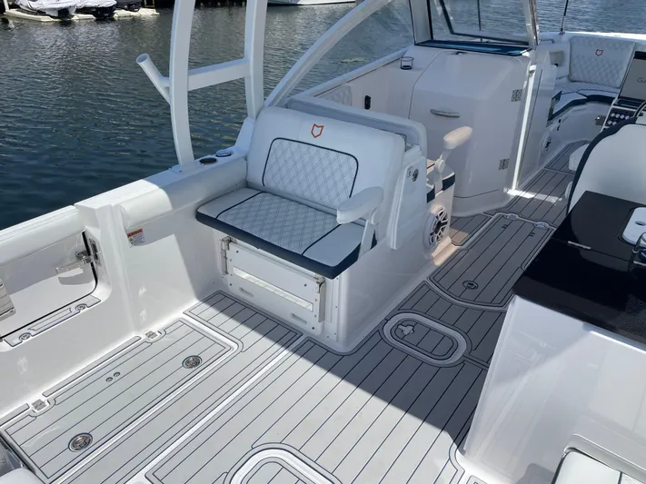  Yacht Photos Pics 2024 Sea Fox 288 Traveler boat interior with seating and deck view.