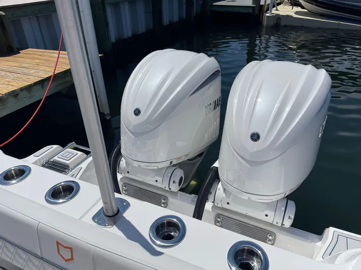  Yacht Photos Pics 2024 Sea Fox 288 Traveler with twin outboard engines docked.