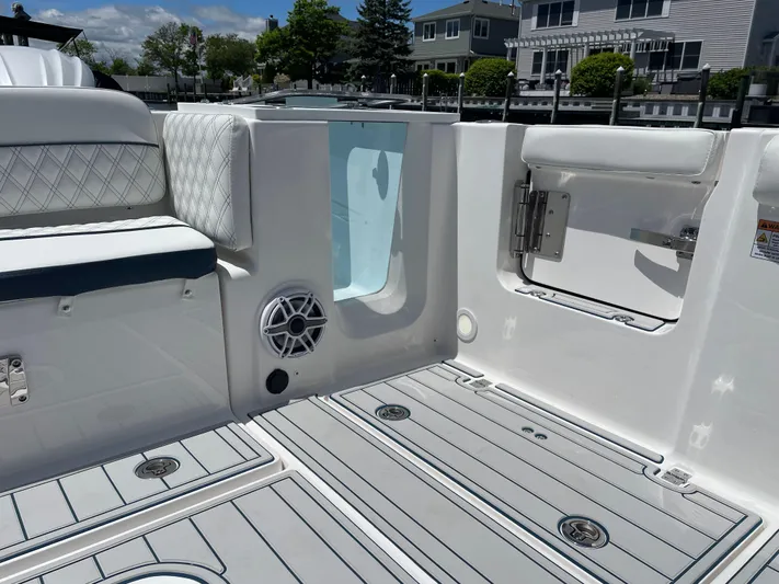  Yacht Photos Pics 2024 Sea Fox 288 Traveler boat interior with seating and storage compartments.