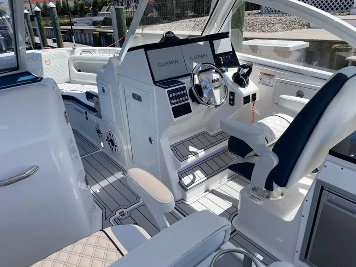  Yacht Photos Pics 2024 Sea Fox 288 Traveler boat cockpit with Garmin navigation system.