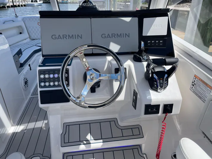  Yacht Photos Pics 2024 Sea Fox 288 Traveler helm with Garmin navigation system.