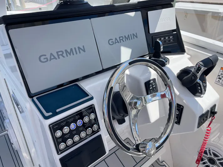  Yacht Photos Pics 2024 Sea Fox 288 Traveler boat dashboard with Garmin navigation system.