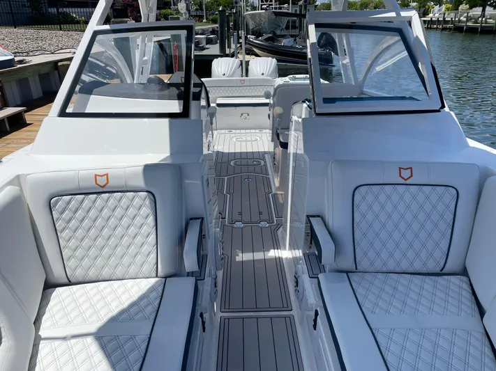  Yacht Photos Pics 2024 Sea Fox 288 Traveler boat interior with luxurious seating and modern design.