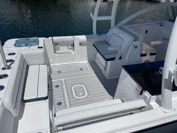  Yacht Photos Pics 2024 Sea Fox 288 Traveler boat interior with seating and deck view.