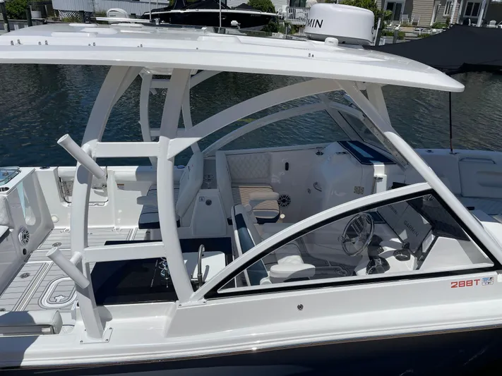  Yacht Photos Pics 2024 Sea Fox 288 Traveler boat with modern design and spacious seating.