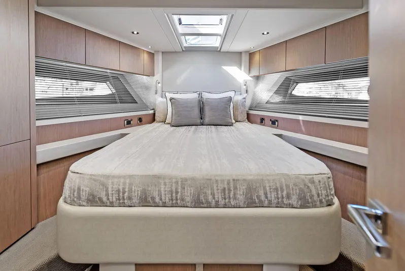 Almost Heaven Yacht Photos Pics Luxurious bedroom interior of 2021 Sunseeker Manhattan 52 yacht with modern design.