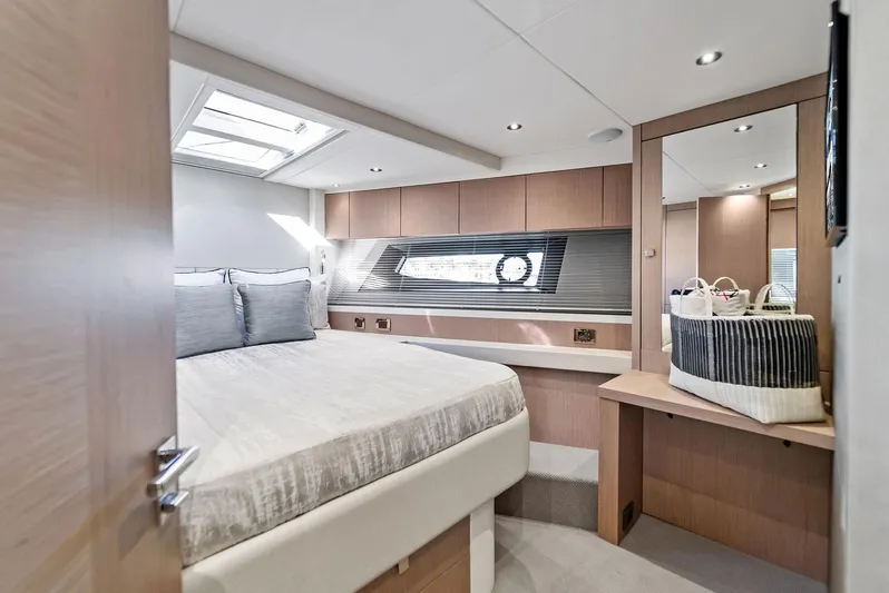Almost Heaven Yacht Photos Pics Luxurious bedroom interior of 2021 Sunseeker Manhattan 52 yacht with modern design.