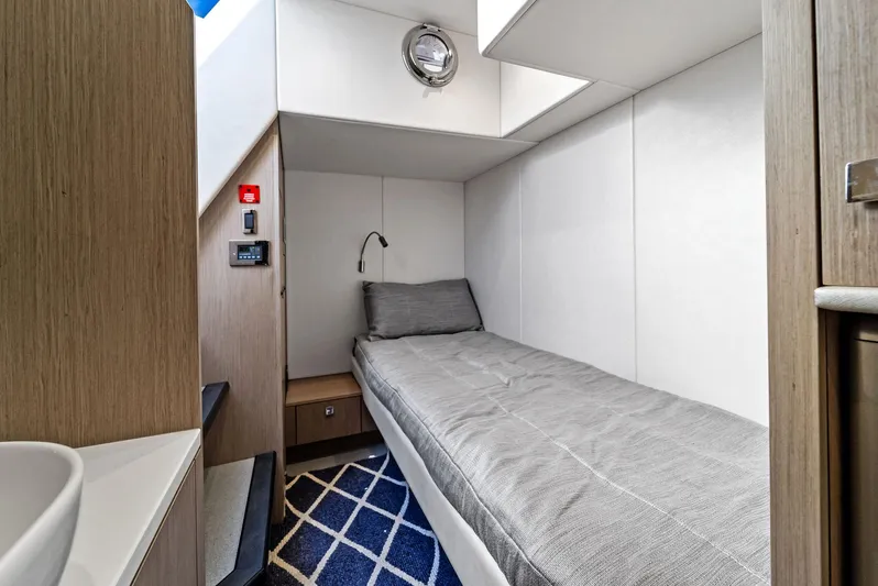 Almost Heaven Yacht Photos Pics 2021 Sunseeker Manhattan 52 cabin with single bed and modern interior design.