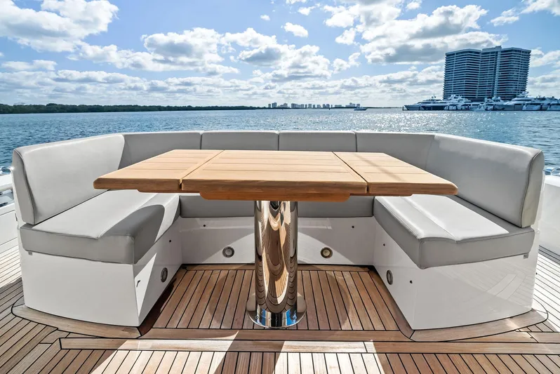 Almost Heaven Yacht Photos Pics Luxury seating area on 2021 Sunseeker Manhattan 52 yacht with ocean view.
