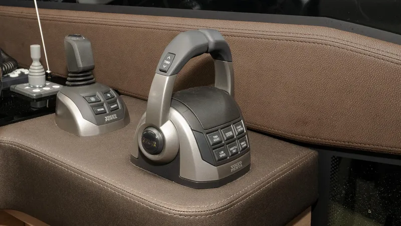 In Stock Yacht Photos Pics 2023 Prestige 520S yacht control panel with modern joystick and throttle levers.