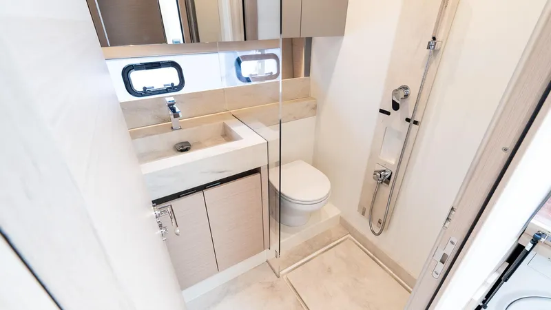 In Stock Yacht Photos Pics Modern bathroom in 2023 Prestige 520S yacht with sleek fixtures and compact design.