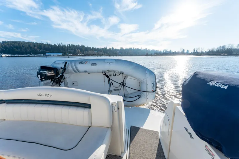  Yacht Photos Pics 2004 Sea Ray 390 Sundancer yacht with inflatable boat on sunny lake.