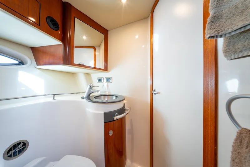  Yacht Photos Pics Luxurious bathroom interior of 2004 Sea Ray 390 Sundancer yacht.