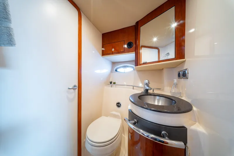  Yacht Photos Pics Luxurious bathroom in 2004 Sea Ray 390 Sundancer yacht with modern fixtures.