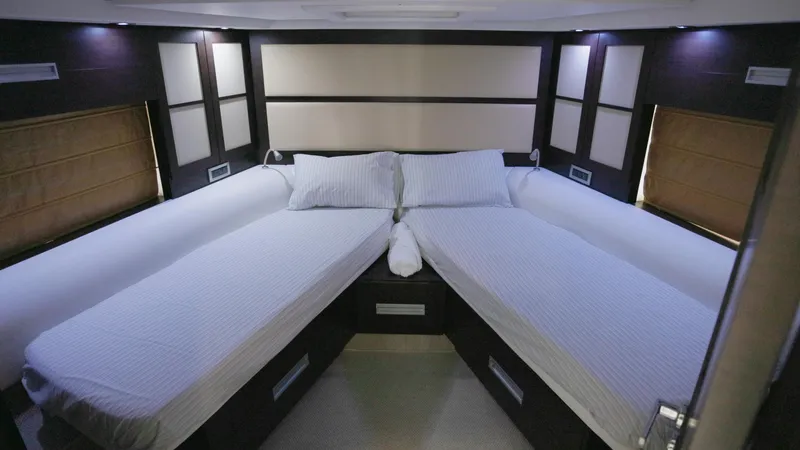  Yacht Photos Pics Luxurious twin bed cabin in a 2008 Azimut 62S yacht.