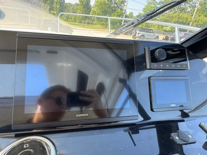  Yacht Photos Pics 2025 Jeanneau NC 795 Series 2 dashboard with Garmin and Yamaha displays.