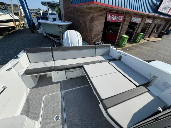  Yacht Photos Pics 2025 Jeanneau NC 795 Series 2 boat interior with spacious seating and modern design.