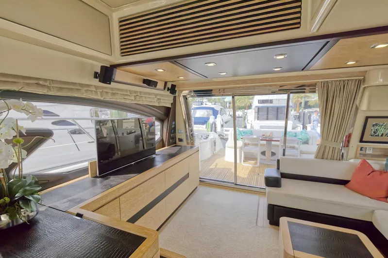 Neena Yacht Photos Pics Luxurious interior of 2015 Azimut 64 Flybridge yacht with modern furnishings.