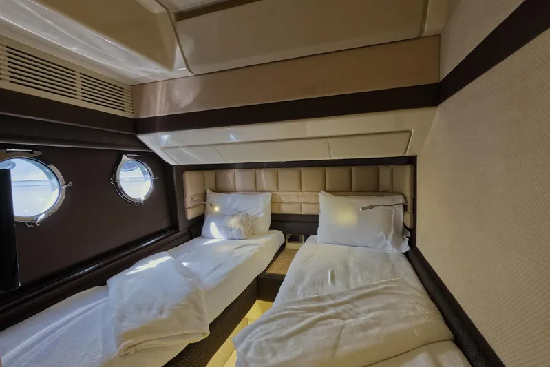 Neena Yacht Photos Pics Twin bed cabin interior of 2015 Azimut 64 Flybridge yacht.