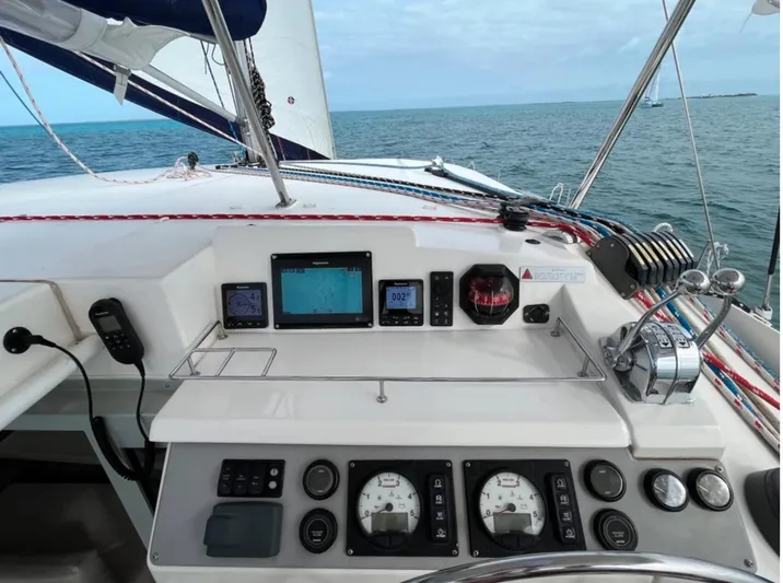  Yacht Photos Pics Control panel of a 2018 Leopard 40 catamaran sailing on open water.