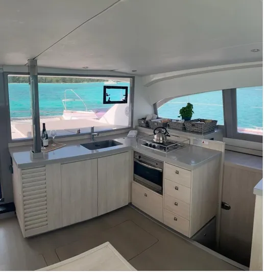  Yacht Photos Pics Modern kitchen interior on a 2018 Leopard 40 catamaran with ocean view.