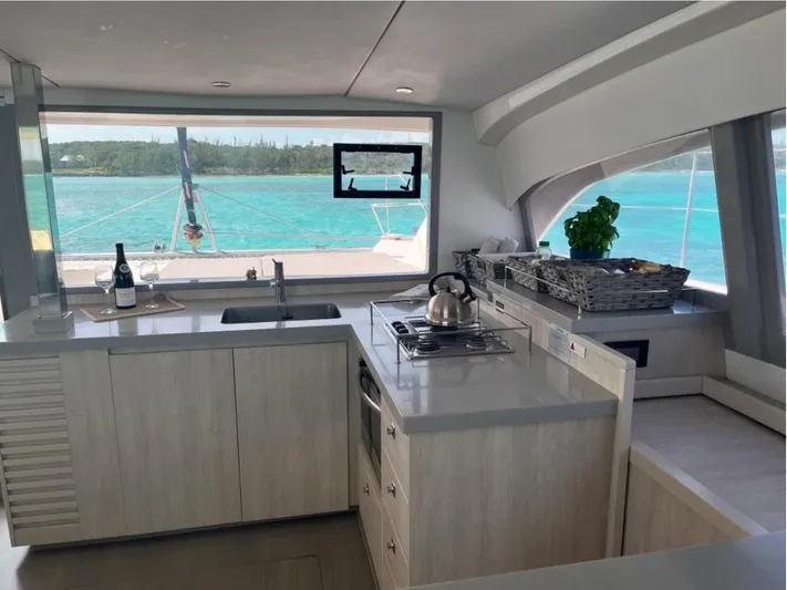  Yacht Photos Pics Modern kitchen interior on a 2018 Leopard 40 catamaran with ocean view.