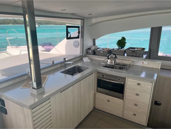  Yacht Photos Pics Modern kitchen interior on a 2018 Leopard 40 catamaran with ocean view.