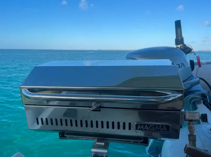  Yacht Photos Pics Stainless steel Magma grill on a 2018 Leopard 40 catamaran, ocean backdrop.