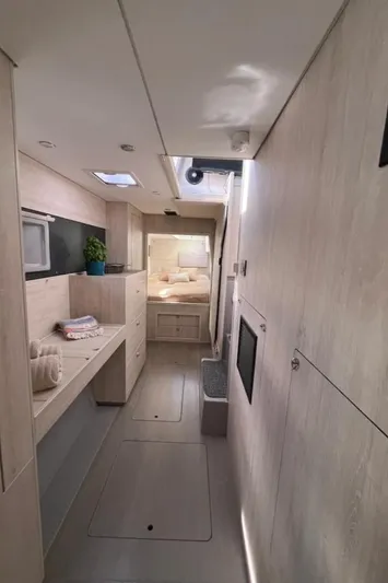  Yacht Photos Pics Interior of 2018 Leopard 40 catamaran, featuring modern design and cozy cabin space.