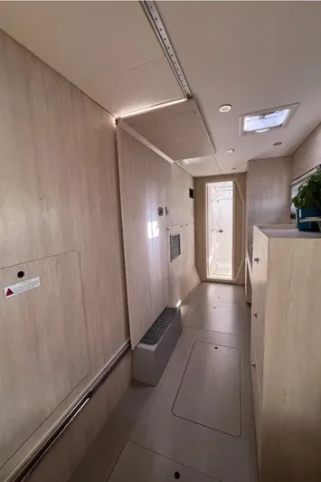  Yacht Photos Pics Interior of a 2018 Leopard 40 yacht, featuring sleek wooden paneling and modern design.