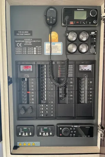  Yacht Photos Pics Electrical control panel of a 2018 Leopard 40, featuring gauges and communication equipment.