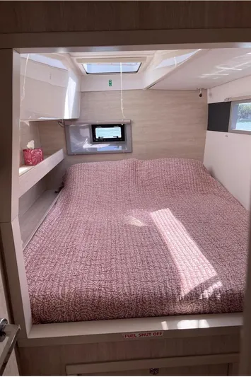  Yacht Photos Pics Cozy bedroom in 2018 Leopard 40 catamaran with skylight and pink bedding.