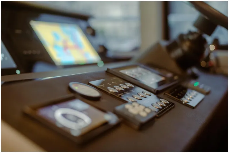  Yacht Photos Pics Control panel of a 2022 Azimut Fly yacht, featuring modern navigation instruments.