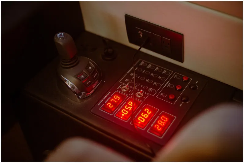  Yacht Photos Pics Control panel of 2022 Azimut Fly yacht with illuminated digital displays and joystick.