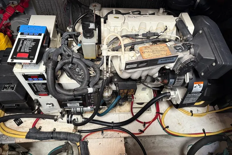 No Worries Yacht Photos Pics Engine room of 2006 Cruisers Yachts 415 Express Motoryacht with Kohler generator.
