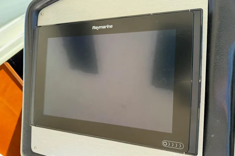 No Worries Yacht Photos Pics Raymarine display on 2006 Cruisers Yachts 415 Express Motoryacht dashboard.