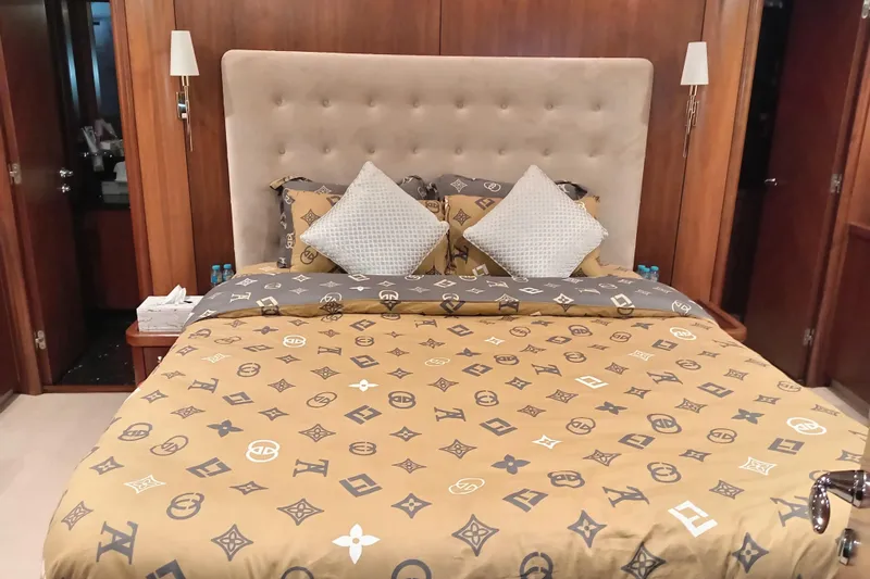  Yacht Photos Pics Luxurious bedroom interior on 2006 Sunseeker Predator 82 yacht with designer bedding.