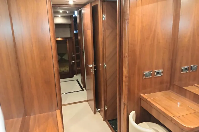  Yacht Photos Pics Luxurious wooden interior of 2006 Sunseeker Predator 82 yacht cabin.