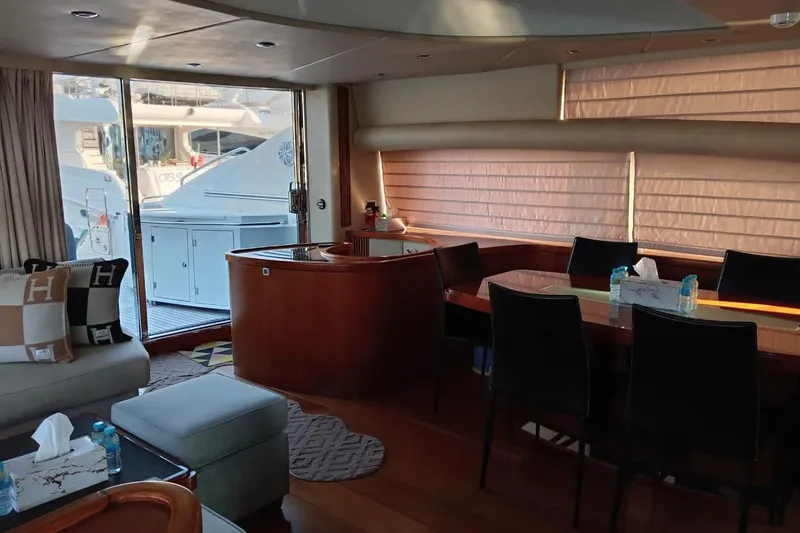  Yacht Photos Pics Luxurious interior of 2006 Sunseeker Predator 82 yacht with elegant dining area.