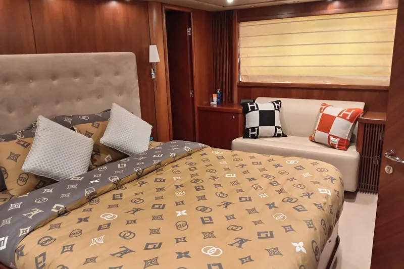  Yacht Photos Pics Luxurious bedroom interior of 2006 Sunseeker Predator 82 yacht with designer bedding and cushions.
