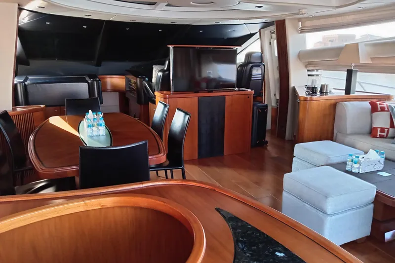  Yacht Photos Pics Luxurious interior of 2006 Sunseeker Predator 82 yacht with elegant dining and seating areas.