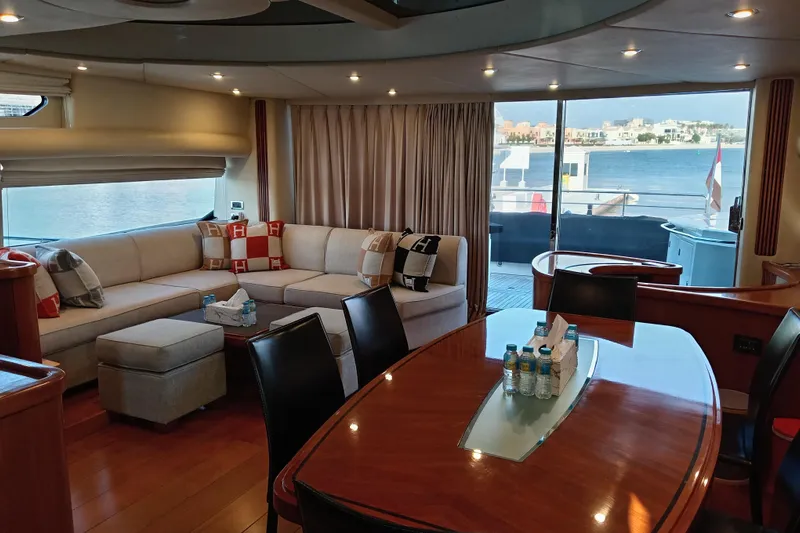  Yacht Photos Pics Luxurious interior of 2006 Sunseeker Predator 82 yacht with elegant seating and dining area.