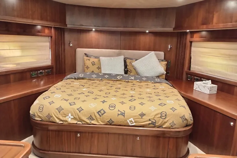  Yacht Photos Pics Luxurious bedroom interior of 2006 Sunseeker Predator 82 yacht with designer bedding.
