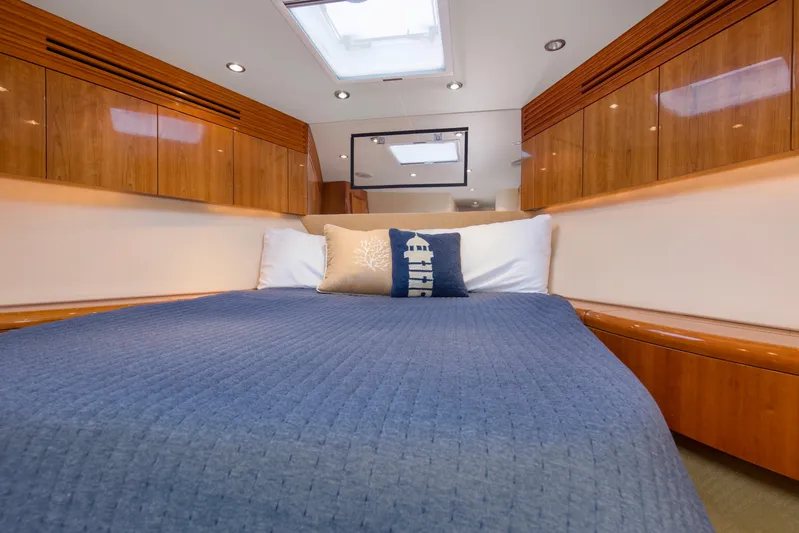 Lady A Yacht Photos Pics Luxurious cabin interior of 2008 Hatteras 54 Convertible yacht with cozy bedding.